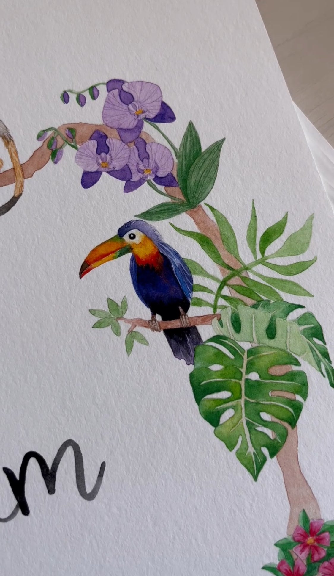 Details of watercolour hornbill on jungle name poster for the nursery