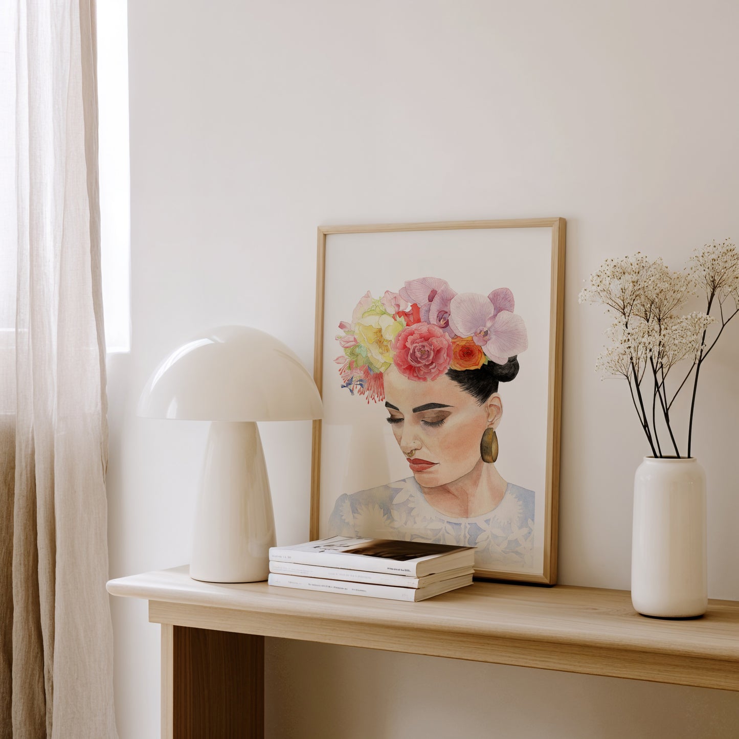 "Patience", feminine watercolour art print of woman with flowers in her hair on decorative shelf with a lamp, books, and a vase against a white wall.