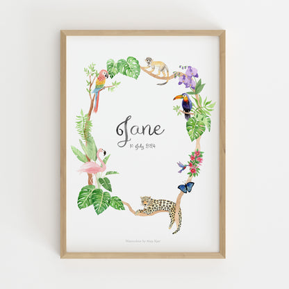 Framed baby name poster with jungle animals and leaves on a white background