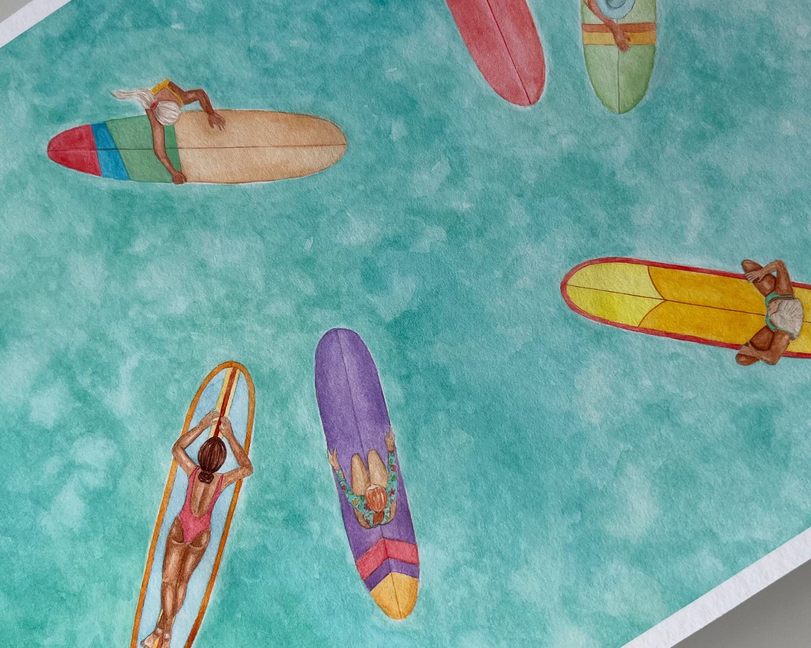 Colorful surfboards with people on a turquoise background