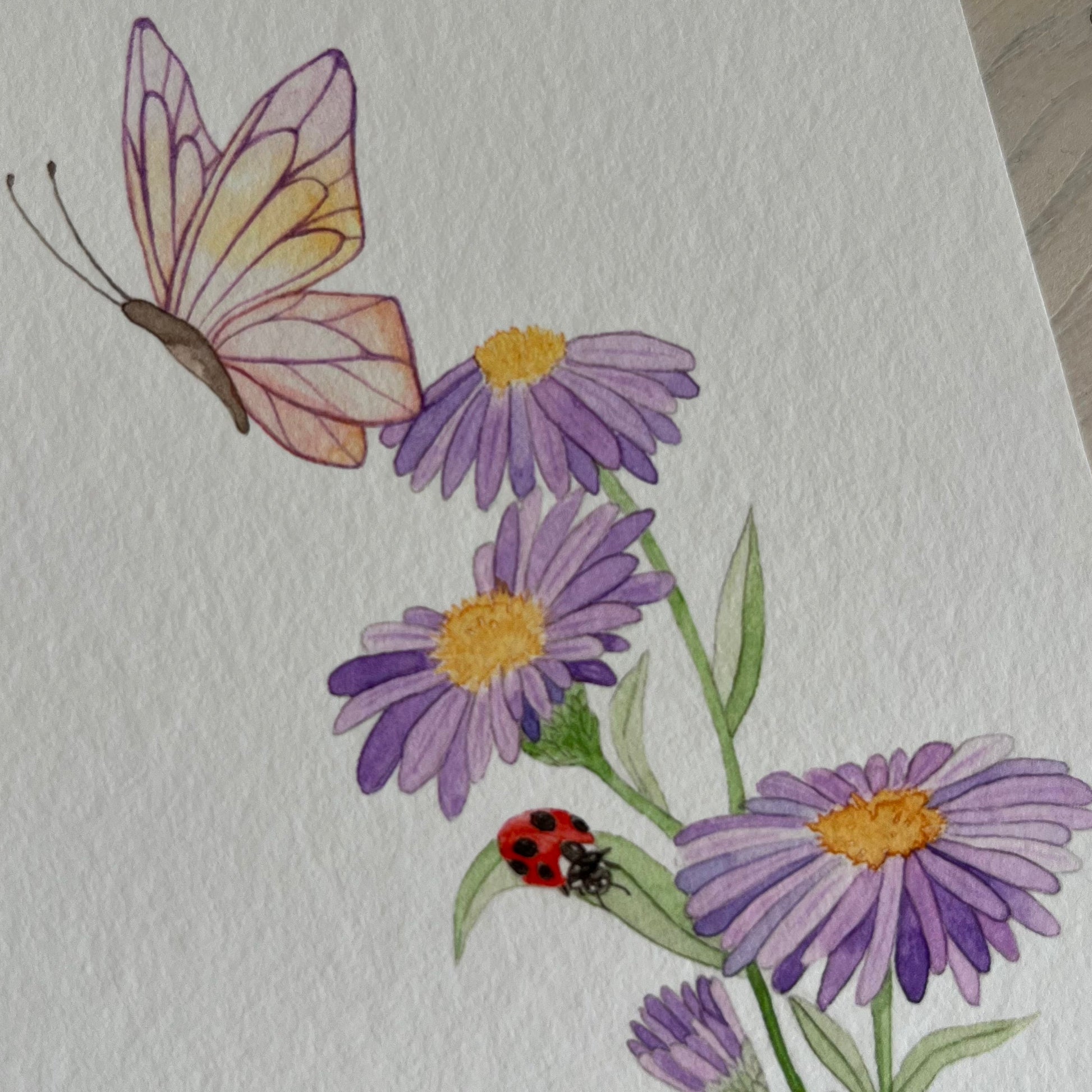 Butterfly and flowers on a textured paper background