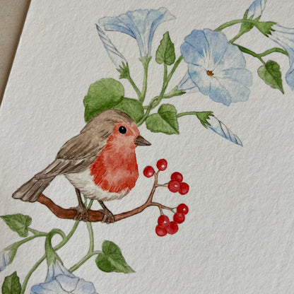 Illustration of a robin on a branch with berries and flowers on a textured paper background