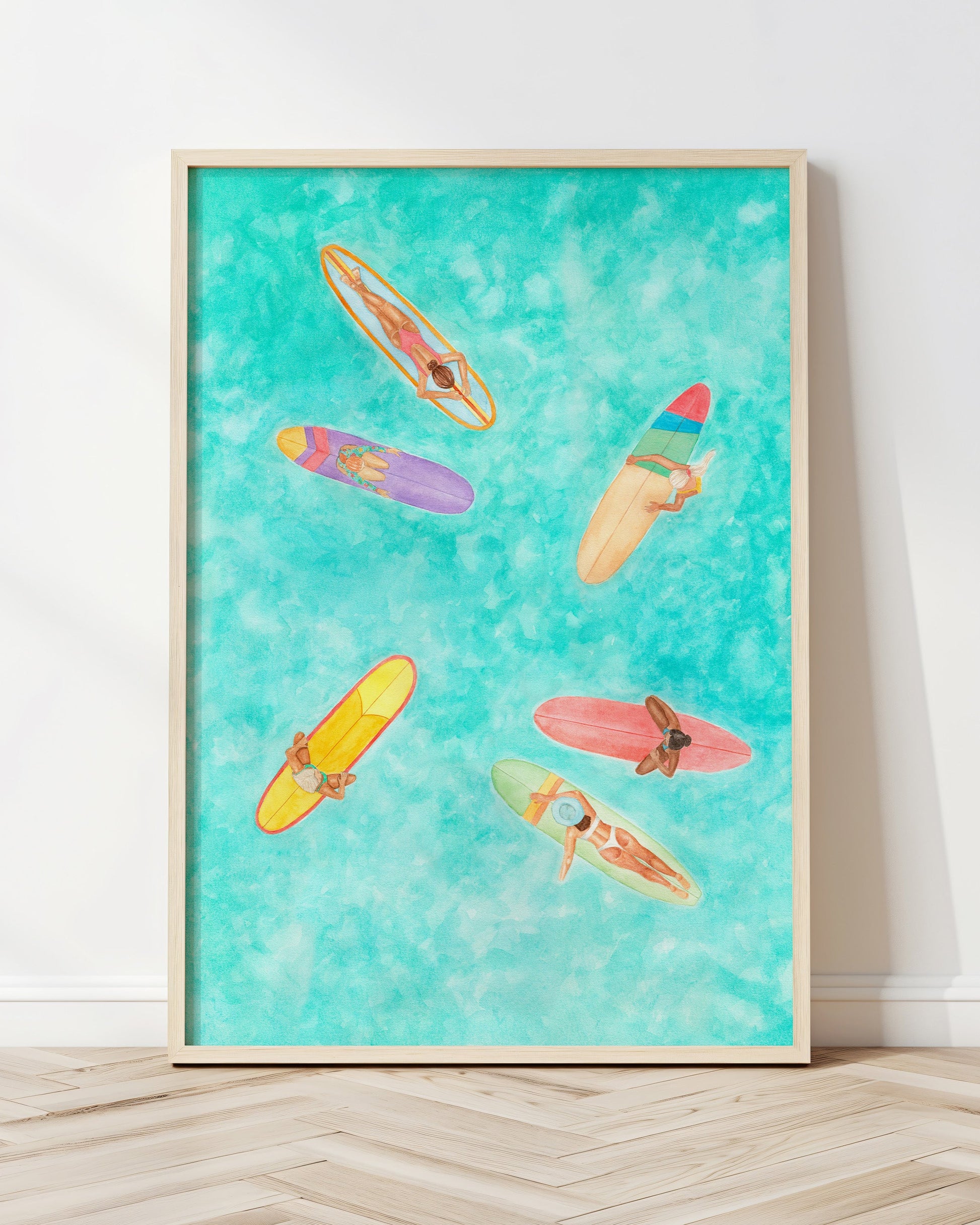 Framed artwork of colorful surfboards on a turquoise background