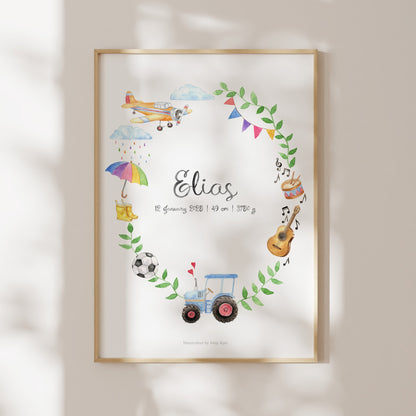 Framed artwork with colorful illustrations and the name 'Elias' on a light wall.