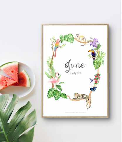 Framed flat-lay of jungle-themed 
 watercolour name print for the nursery with jaguar, hornbill, flamingo and more, next to green leaves and watermelon