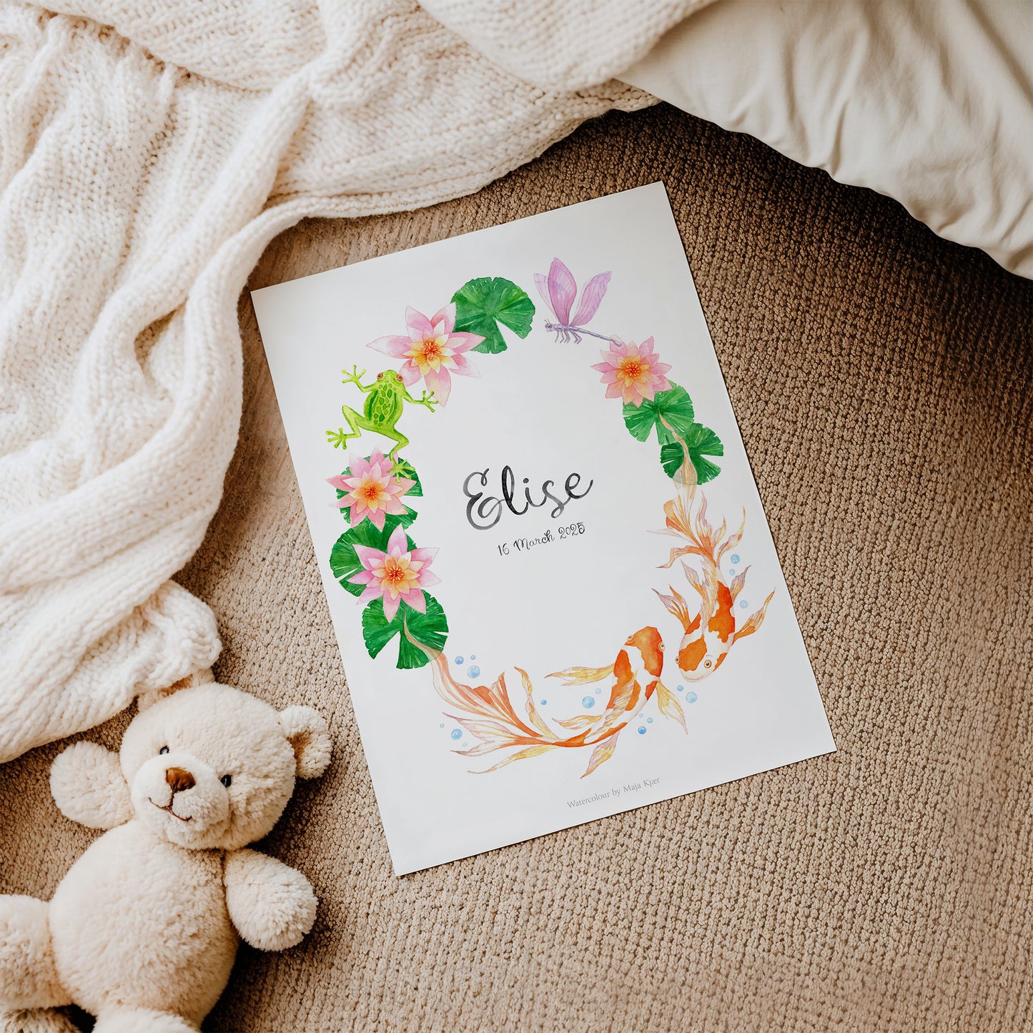 Decorative baby name print with name 'Elise' for zodiac sign Pisces on textured surface with a teddy bear.
