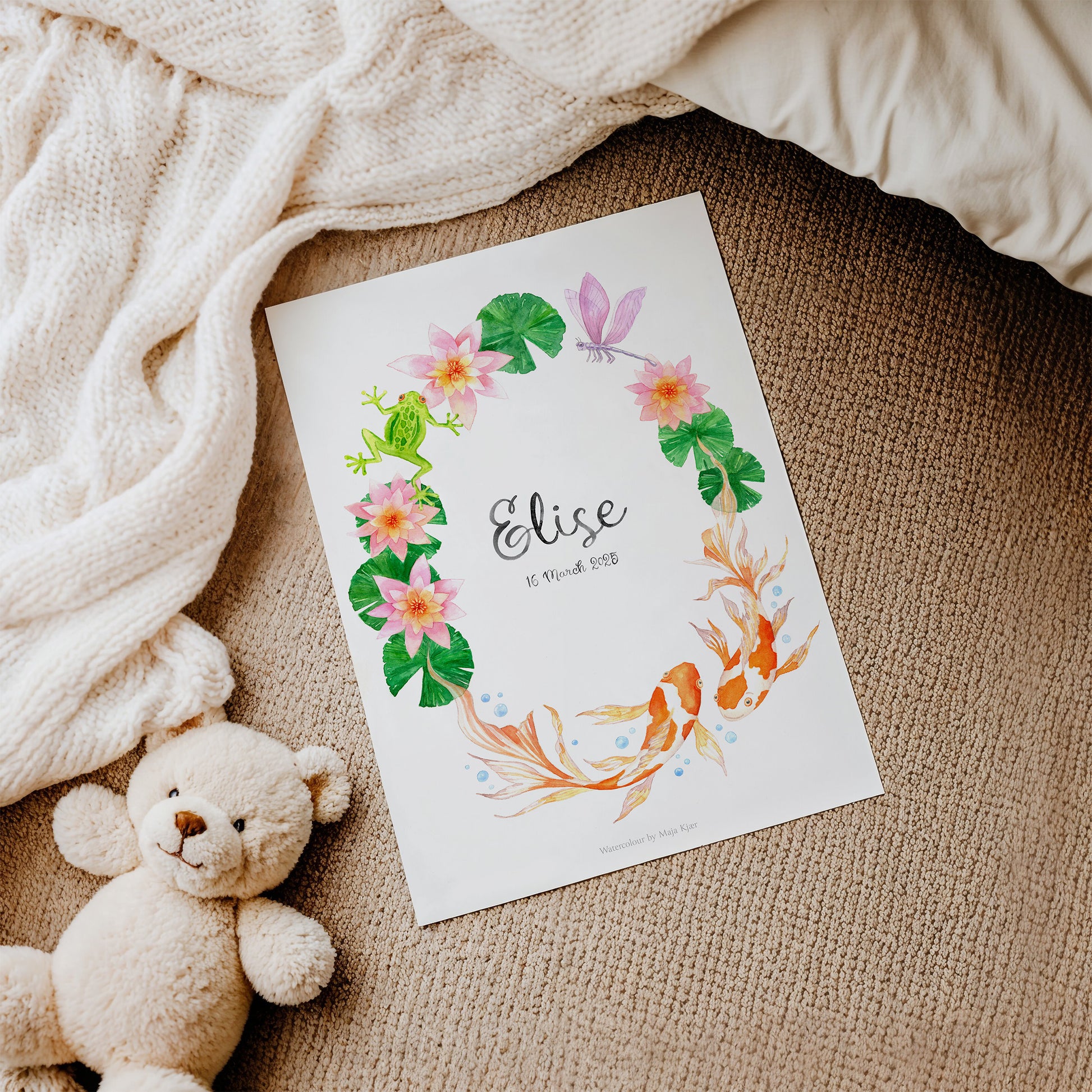Decorative baby name print with name 'Elise' for zodiac sign Pisces on textured surface with a teddy bear.