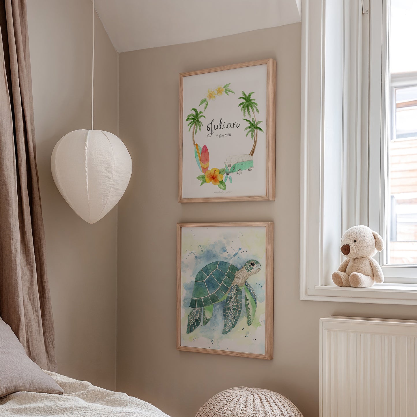 Children's room with framed artwork of a turtle and floral design, teddy bear on windowsill.