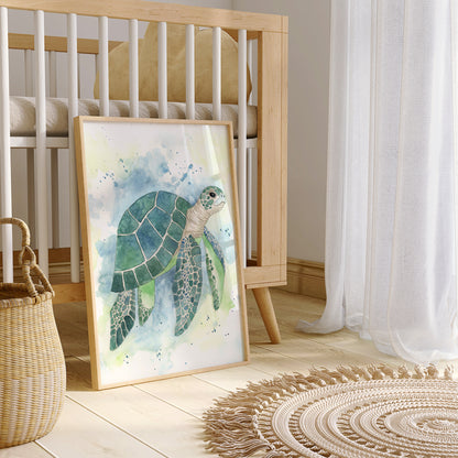 Framed artwork of a watercolour sea turtle in a nursery with a crib and basket.