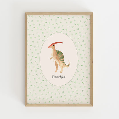 A framed art print featuring a watercolor illustration of a Parasaurolophus dinosaur in the center, surrounded by a light green leaf pattern on a cream background, enclosed in a natural wood frame.